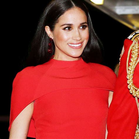 Meghan Markle in Red Cape Dress at the Mountbatten Music .